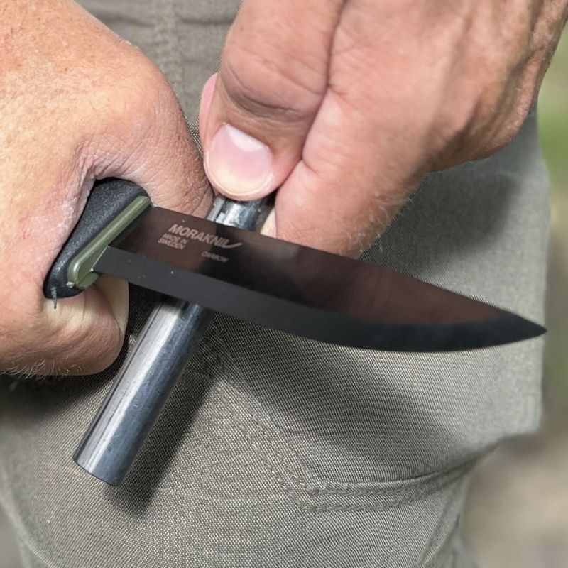 Morakniv Bushcraft Survival Black knife used striking fire starter, custom kit builds, excellent service, A Way Through the Wilderness