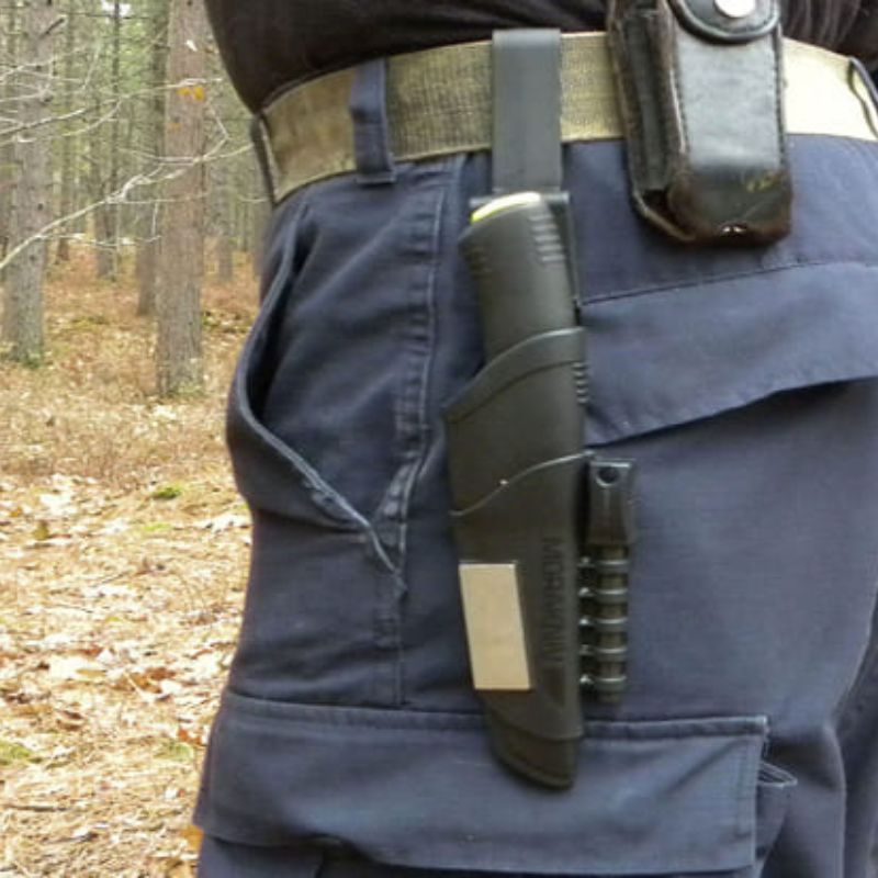 Morakniv Bushcraft Survival Black knife securely sheathed on belt, rugged bushcraft gear, custom kit builds A Way Through the Wilderness